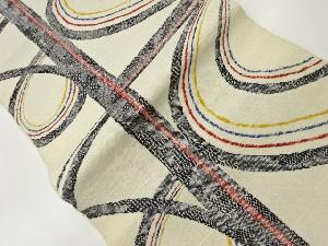 手織り真綿紬直線に変わり曲線模様織出し名古屋帯